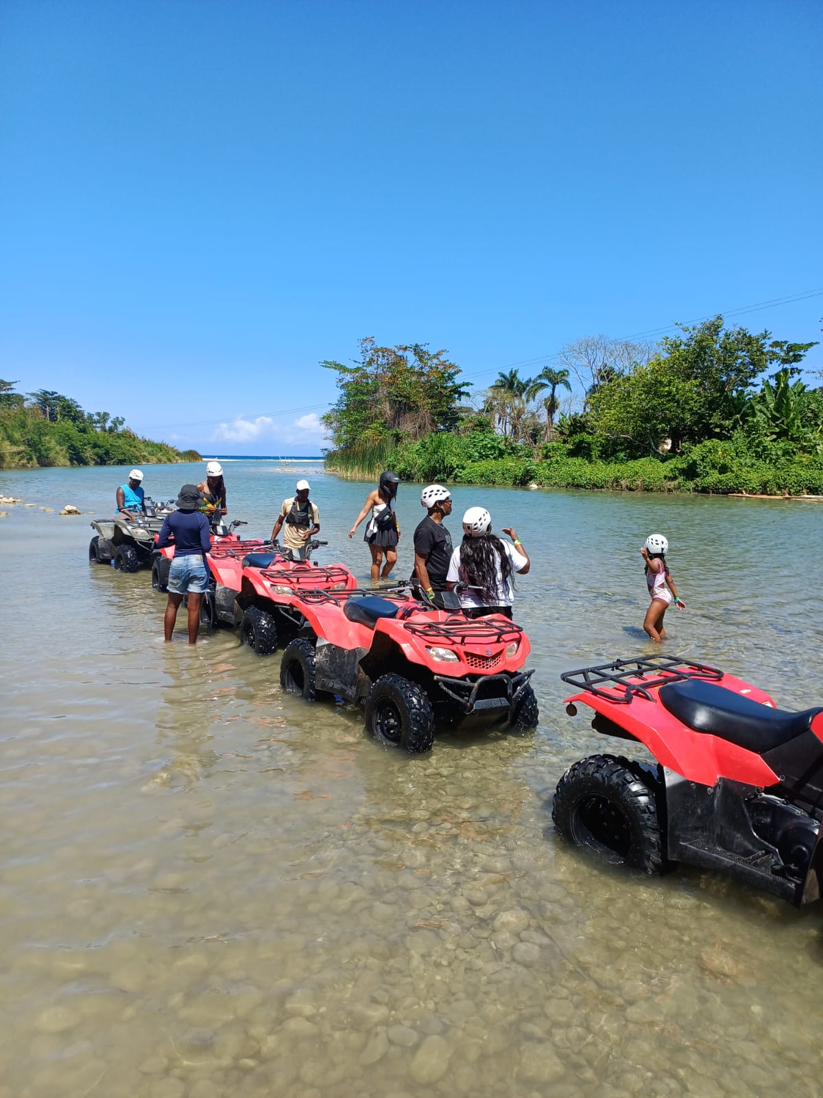 ATV adventure beside a Jamaican river