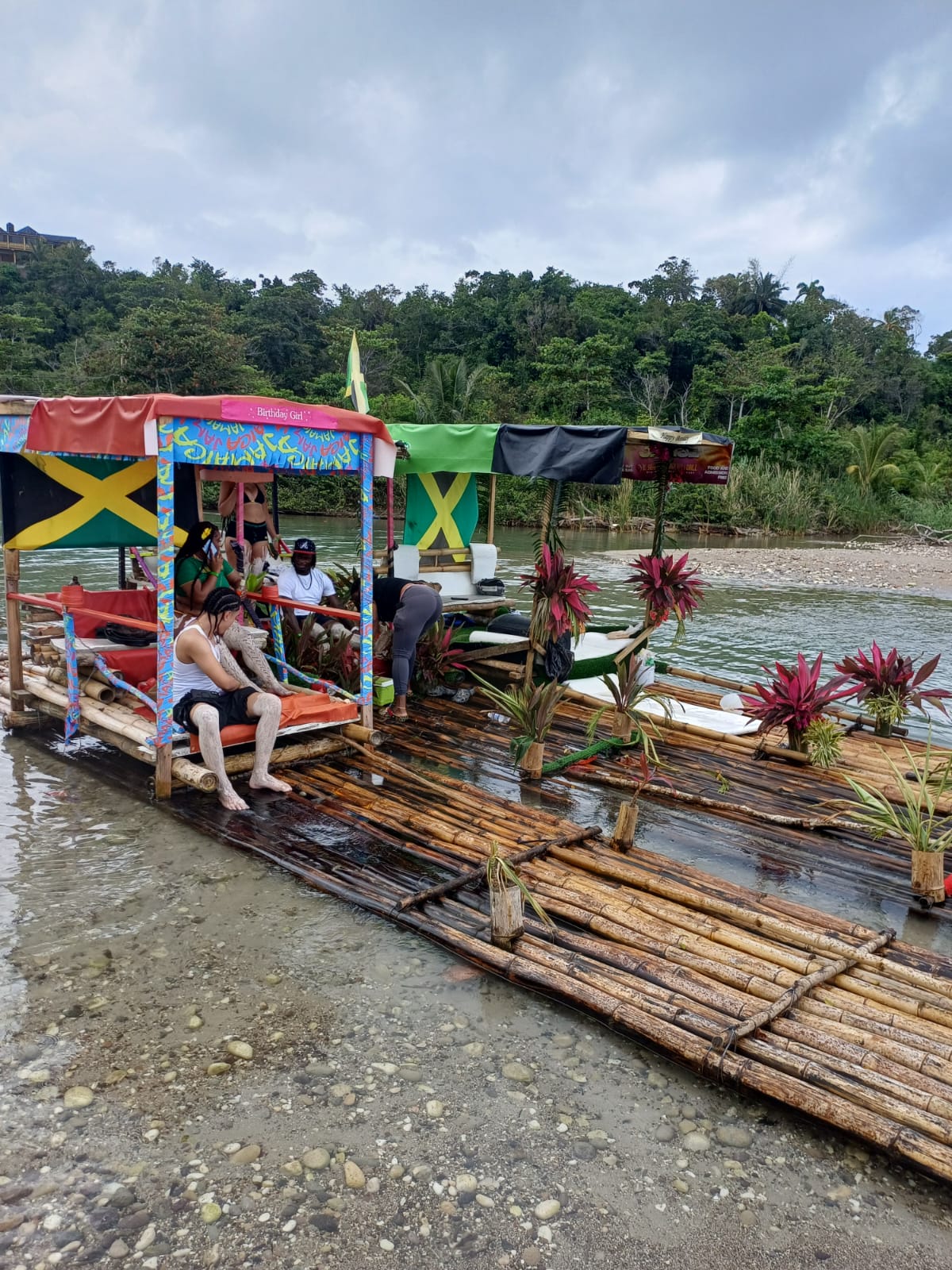 Decorated bamboo rafts on a Jamaican river